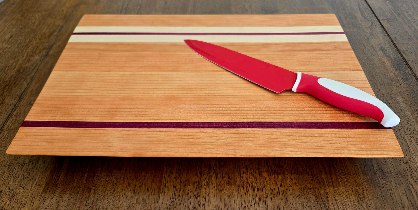 Morning Sun – Handcrafted Cherry, Maple & Purpleheart Cutting Board | Premium Edge Grain Kitchen Board